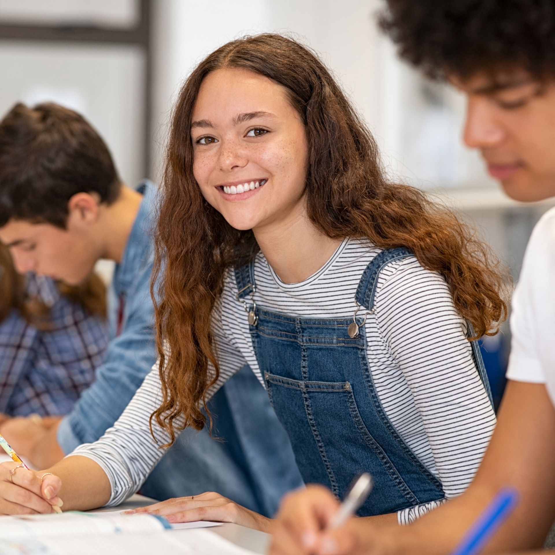 Teenage Girl smiling to the camera (Grades 7-9)
